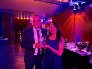 Kenes Group CEO, Ori Lahav with Nia Zárate Angarita who received the award on behalf of her colleague Audrey Alloul, Chief Digital Officer at Kenes Group