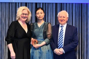IAPCO Innovation Award winner Ms Hyojung Ok of EZpmp receiving the award at IMEX Frankfurt 2022 Gala Dinner